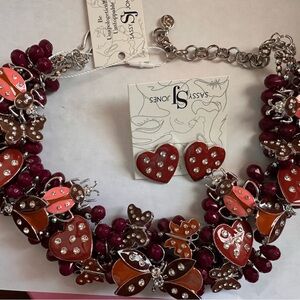 Sassy Jones Burgundy Love bug necklace and earrings.
